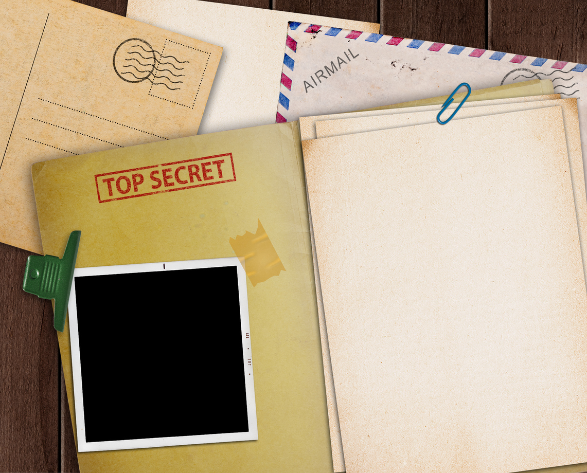 A folder labeled top secret. Top secret security clearance can have even more benefits than lower clearance levels.