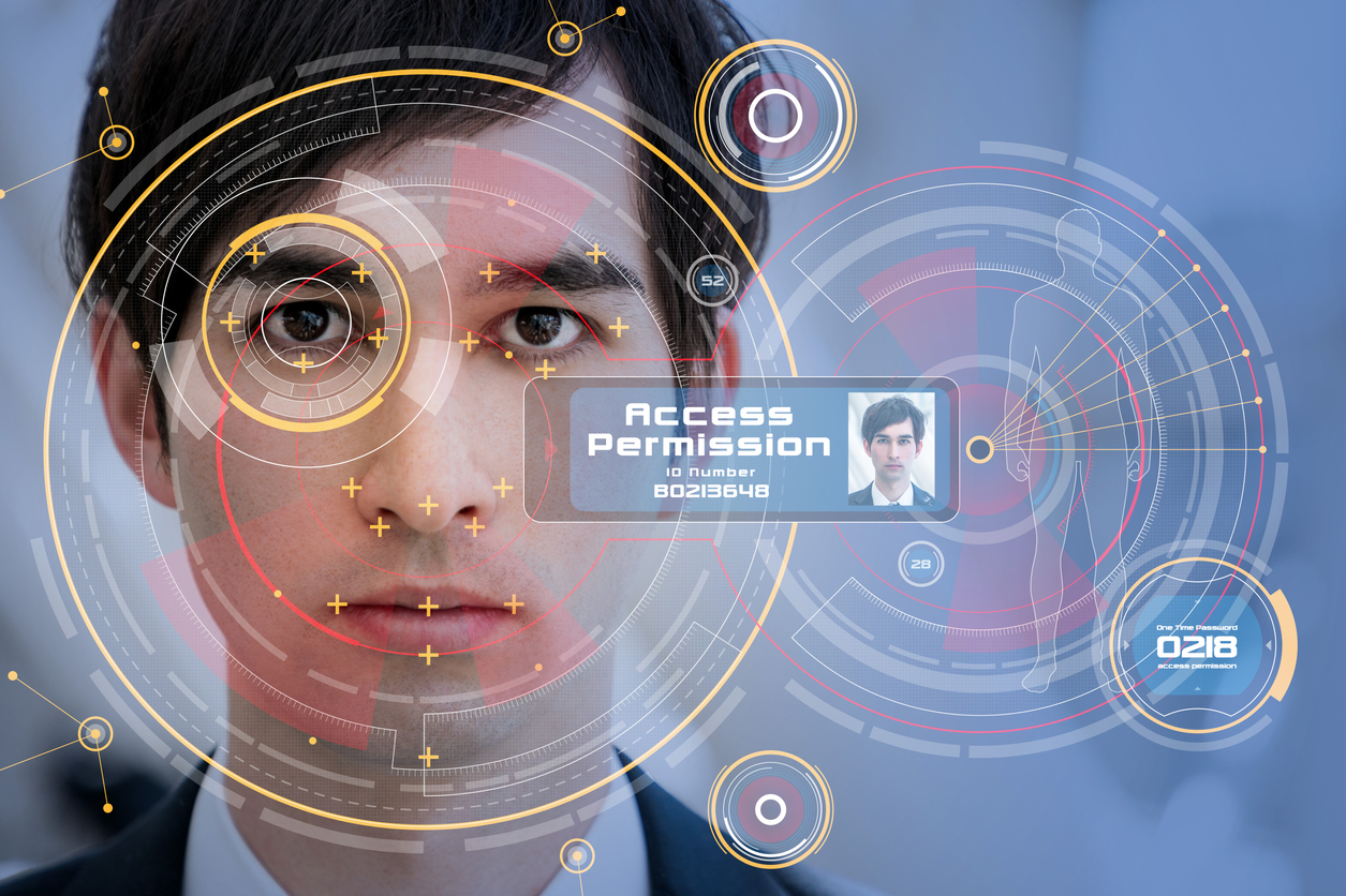 A man being scanned by facial recognition software. Artificial intelligence and cyber crime sometimes go together when hackers use AI to bypass physical security recognition. 