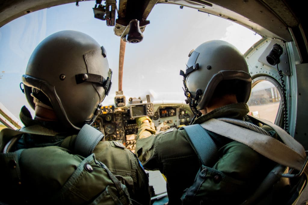 Two military pilots in the cockpit