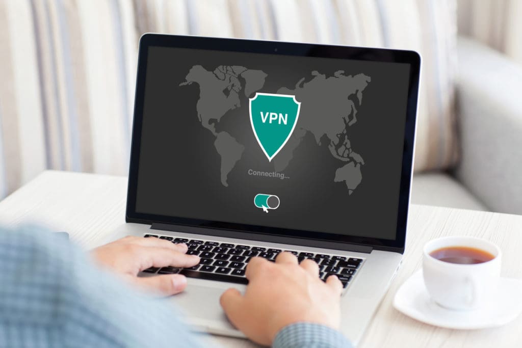 An employee logging into a VPN on their laptop, serving as an example of using a VPN for government work