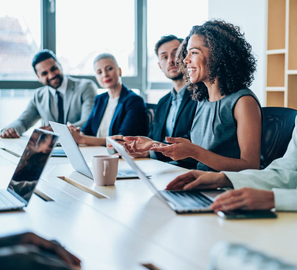 Group of business persons in business meeting. Group of entrepreneurs on meeting in board room. Corporate business team on meeting in the office.